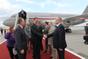 After landing, the Prime Minister is welcomed by Czech representatives in Russia.