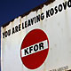 Kosovo KFOR cedule ilustrace