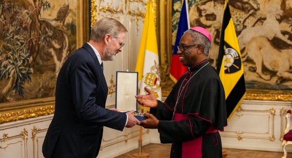 Prime Minister Petr Fiala receives the Grand Cross of the Order of Pius IX from the Apostolic Nuncio to the Czech Republic, Archbishop Jude Thaddeus Okolo, on November 20, 2025.